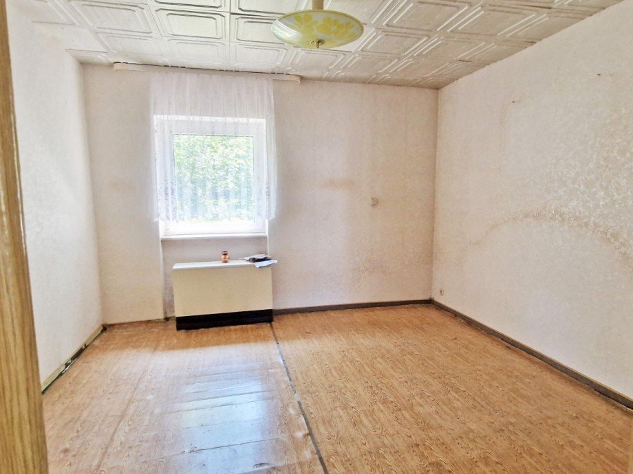 Schlafzimmer-2 im Erdgeschoss Einfamilienhaus Karlsburg