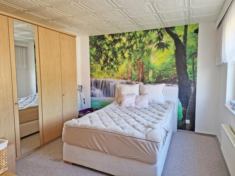 Schlafzimmer im Erdgeschoss Einfamilienhaus Trassenheide